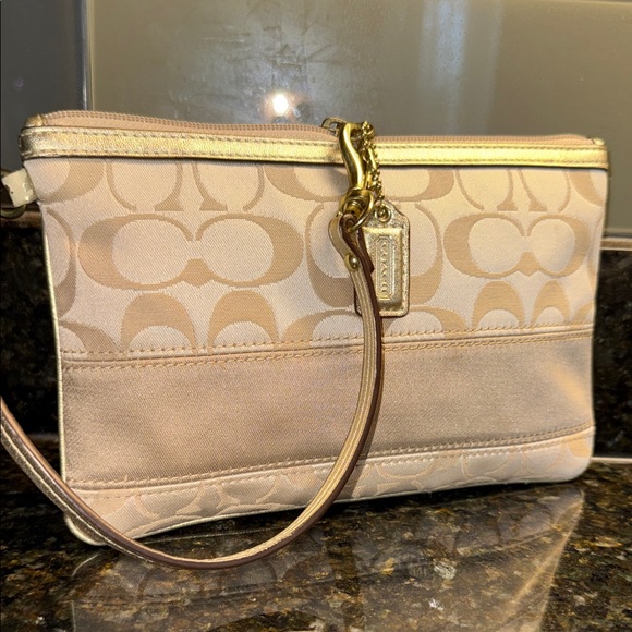 Coach Handbags - Coach Signature Beige Wristlet Clutch